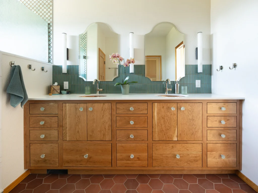 Modern bathroom with wooden cabinetry.